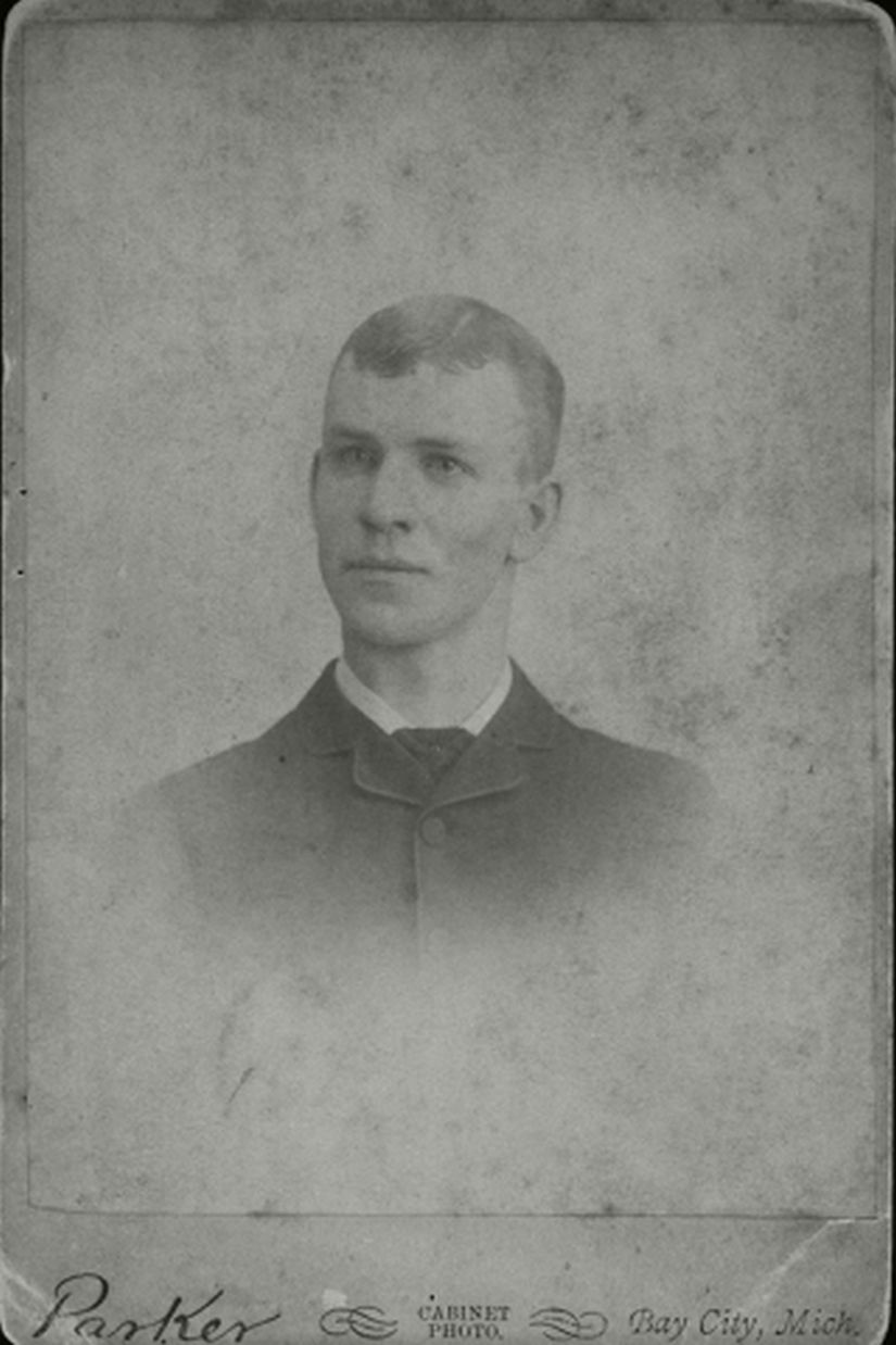 Image of a the head and chest of a young man