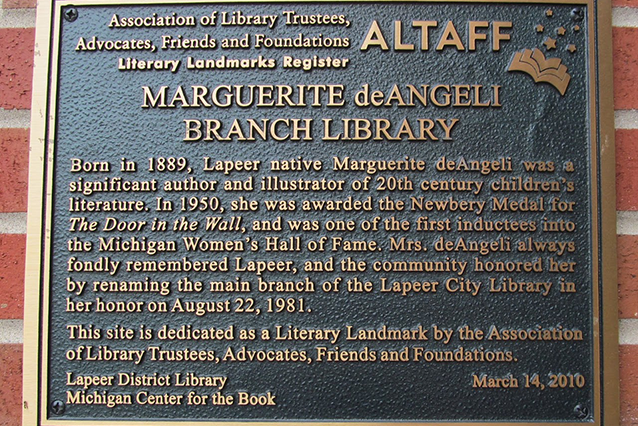 The Marguerite deAngeli Library plaque officially declaring the library a Literary Landmark in honor of Marguerite de Angeli